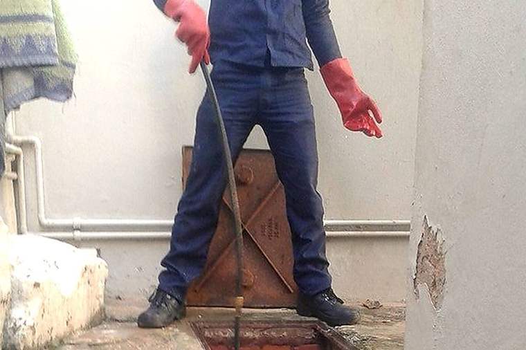 Blocked drain inspection chamber cleared by Dudley's Plumbers